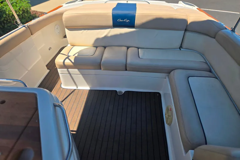 Slide: The Image of Luxurious seating on 2002 Chris-Craft Launch 28 GT I/O boat with elegant upholstery. - 23