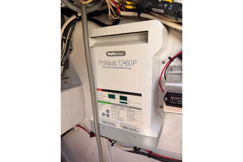 Slide: The Image of ProMariner ProNautic 12-60P charger in a 1991 Caliber 33 boat. - 53