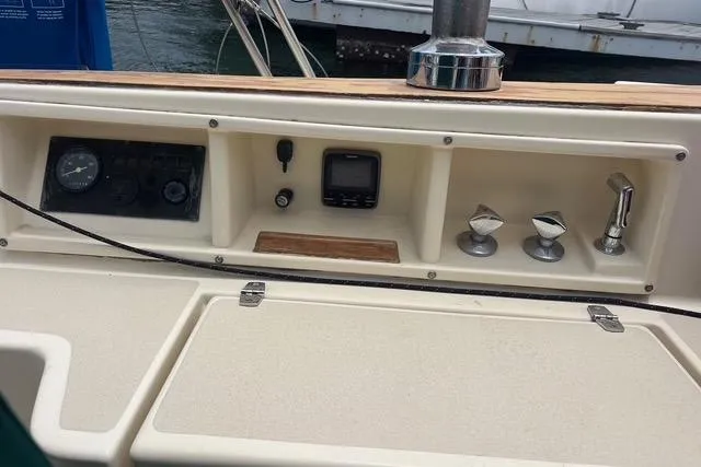 Slide: The Image of Control panel of a 1991 Caliber 33 sailboat with navigation instruments. - 22
