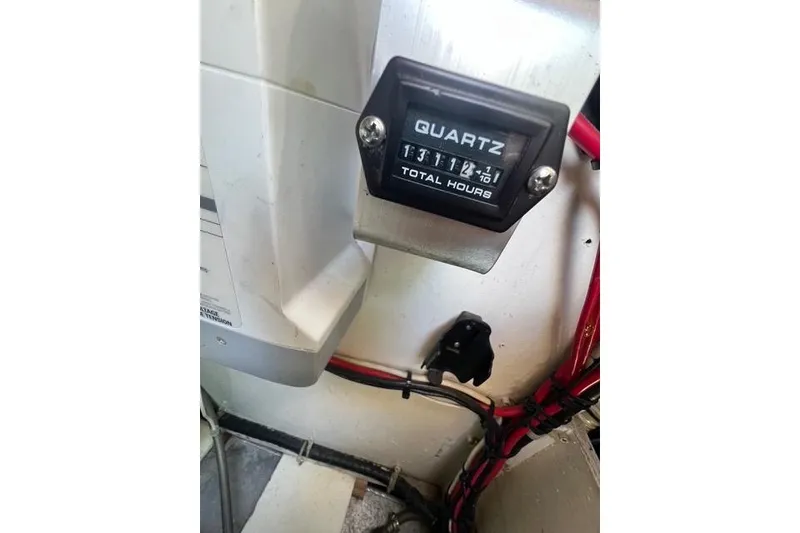 Slide: The Image of Quartz hour meter displaying total hours on Caliber 33, 1991 model. - 52