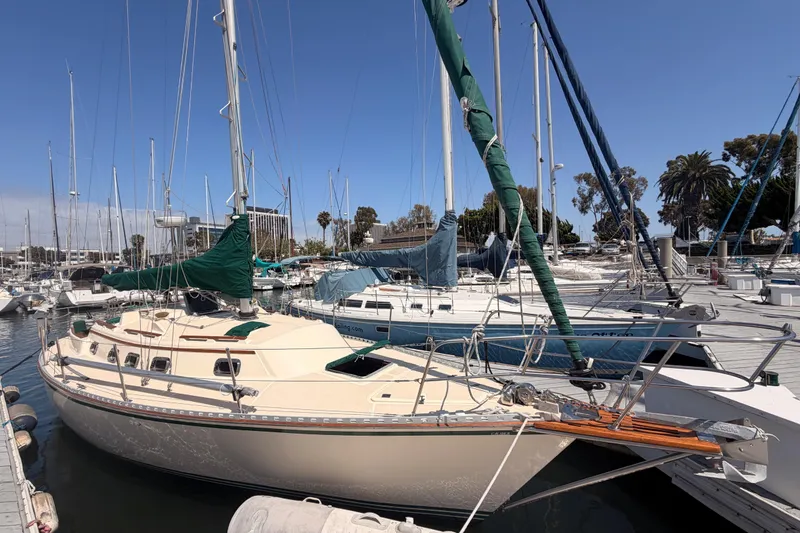 Slide: The Image of Sailboat docked at marina, 1991 Caliber 33 model, sunny day, clear blue sky. - 6