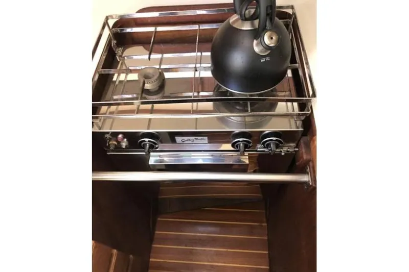 Slide: The Image of Stainless steel stove with kettle on a 1991 Caliber 33 yacht. - 60