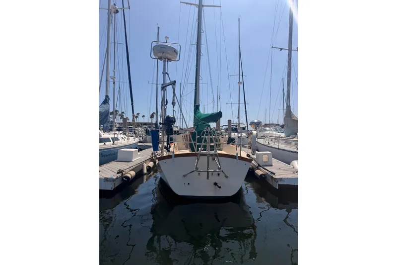 Slide: The Image of Sailboat docked at marina, 1991 Caliber 33 model, sunny day. - 20