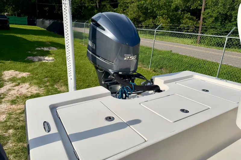 Slide: The Image of 2009 Pathfinder 2200 Tournament Edition boat with Yamaha 250 engine, parked outdoors. - 6