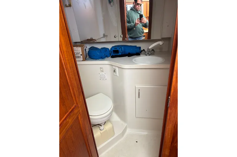 Slide: The Image of Bathroom interior of 1995 Carver 356 Aft Cabin Motor Yacht with sink and toilet. - 25
