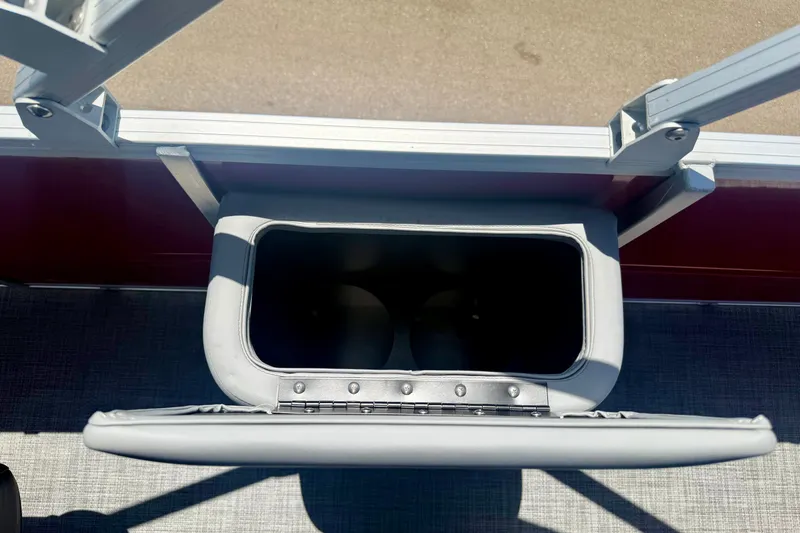 Slide: The Image of Open storage compartment on 2026 Sun Tracker Party Barge 22 RF XP3 boat. - 15