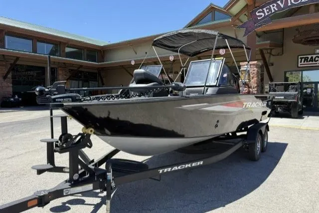 The Image of 2026 Tracker Targa V-19 Combo boat on trailer outside dealership. - 0