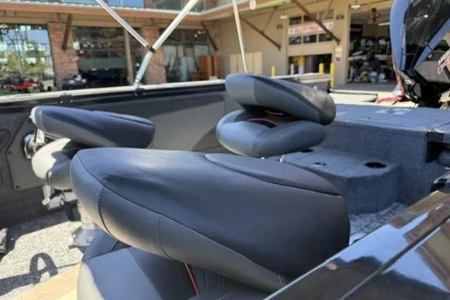 Slide: The Image of 2026 Tracker Targa V-19 Combo boat interior with comfortable seating and modern design. - 10