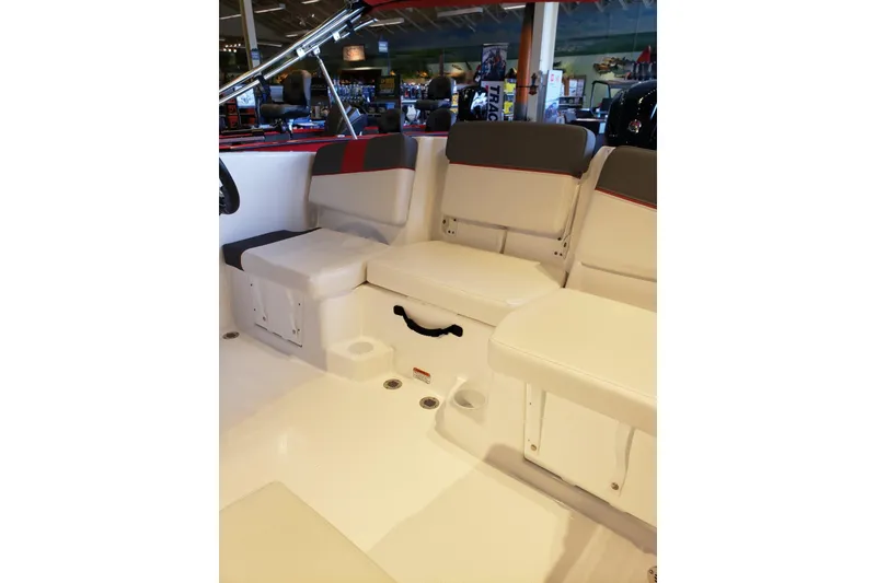 Slide: The Image of 2026 Tahoe T16 boat interior with cushioned seating and storage compartments. - 8