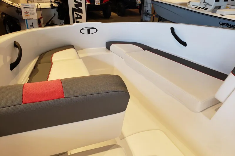 Slide: The Image of 2026 Tahoe T16 boat interior with cushioned seating and sleek design. - 9
