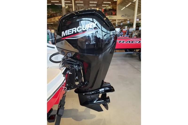 Slide: The Image of Mercury outboard motor on a 2026 Tahoe T16 boat, displayed indoors. - 4