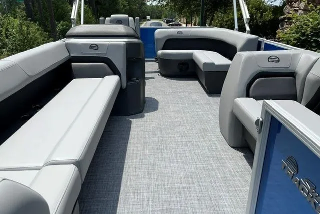 Slide: The Image of 2026 Sun Tracker Party Barge 18 DLX interior with spacious seating and modern design. - 6