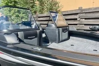Slide: The Image of 2026 Tracker Targa V-19 Combo boat with sleek design and spacious seating. - 5