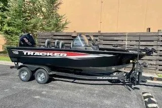 The Image of 2026 Tracker Targa V-19 Combo boat on trailer, parked outdoors. - 0