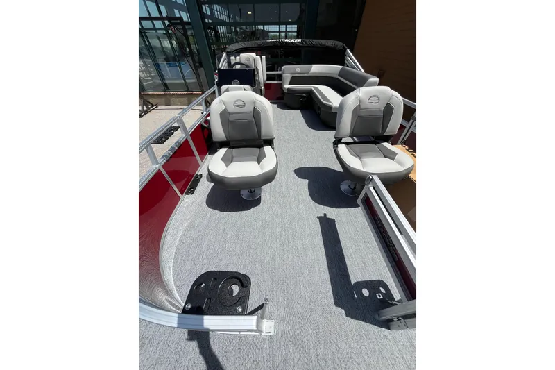 Slide: The Image of 2026 Sun Tracker Bass Buggy 16 XL Select pontoon boat interior with seating and modern design. - 3