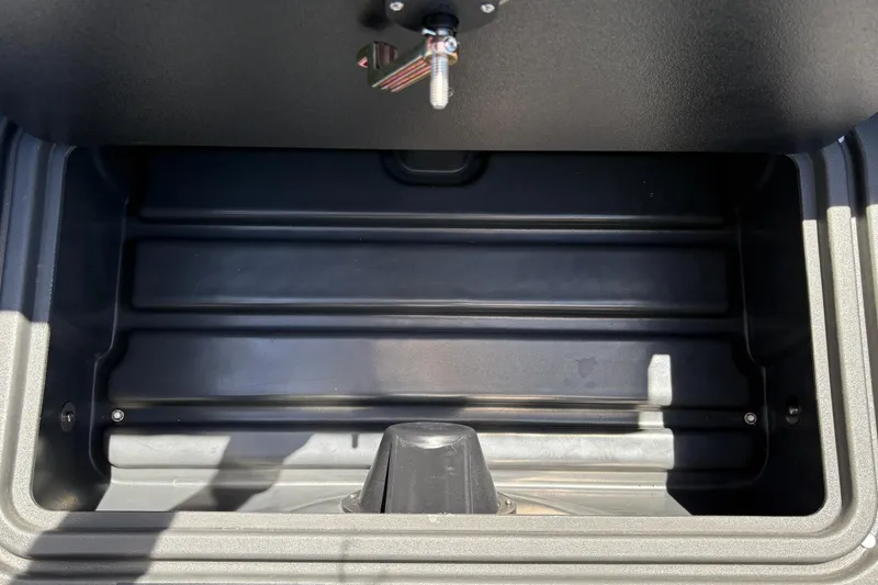 Slide: The Image of Open storage compartment of 2026 Sun Tracker Party Barge 22 XP3 boat. - 28