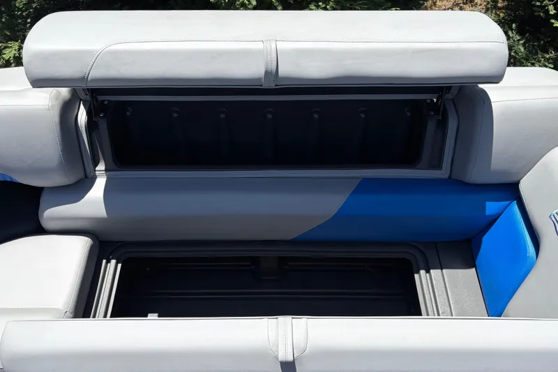 Slide: The Image of Sun Tracker Party Barge 22 XP3 2026 seating with open storage compartments. - 42