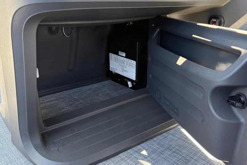 Slide: The Image of Storage compartment of 2026 Sun Tracker Party Barge 22 XP3 pontoon boat. - 34