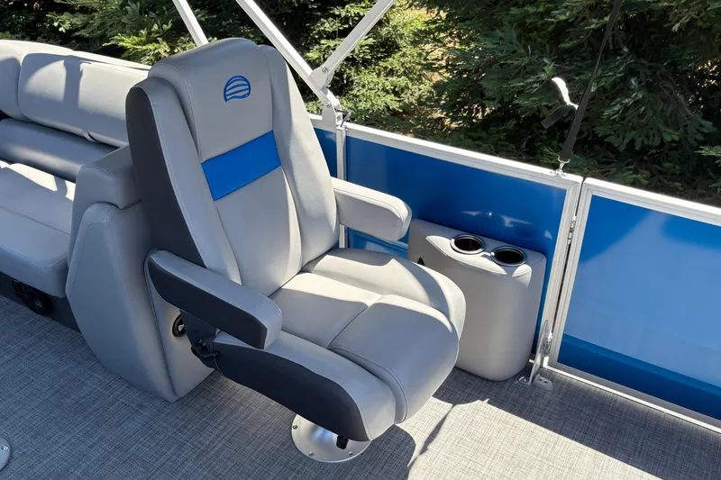 Slide: The Image of Luxurious seating on 2026 Sun Tracker Party Barge 22 XP3 pontoon boat with cup holders. - 26