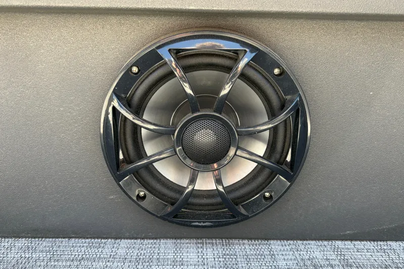 Slide: The Image of Speaker on 2026 Sun Tracker Party Barge 22 XP3, featuring sleek black grille design. - 31