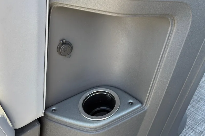 Slide: The Image of Cup holder and power outlet on 2026 Sun Tracker Party Barge 22 XP3. - 39