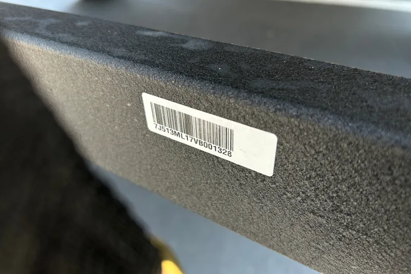 Slide: The Image of Barcode sticker on 2026 Sun Tracker Party Barge 18 DLX boat component. - 96