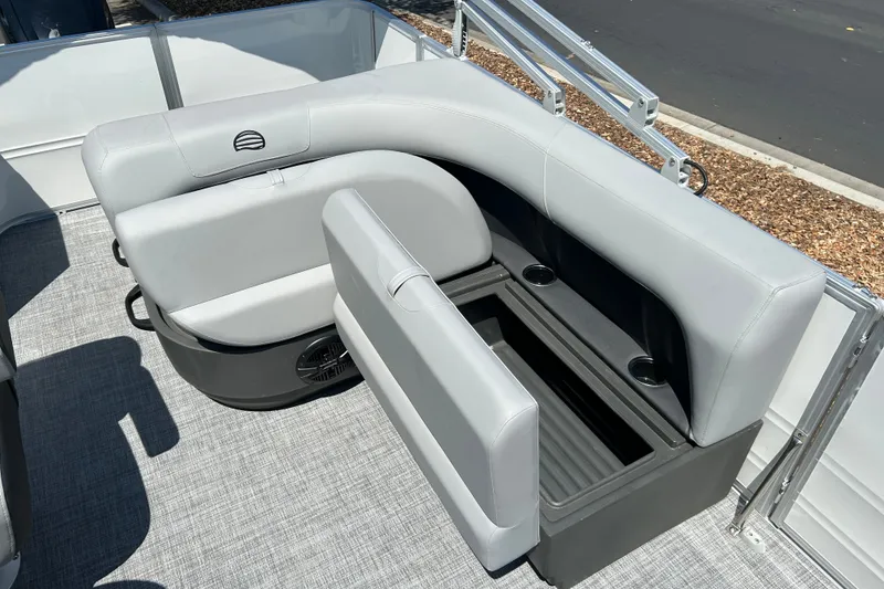 Slide: The Image of 2026 Sun Tracker Party Barge 18 DLX seating with storage and cup holders. - 14