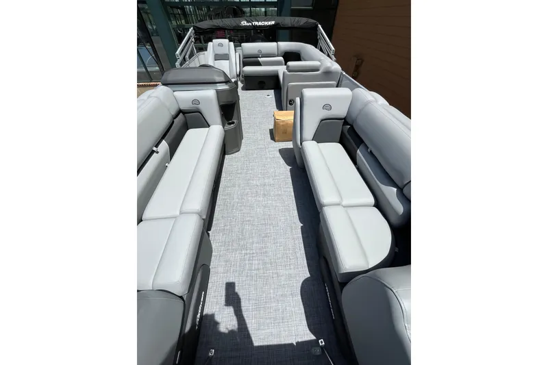 Slide: The Image of 2026 Sun Tracker Party Barge 20 DLX with spacious seating and modern design. - 2