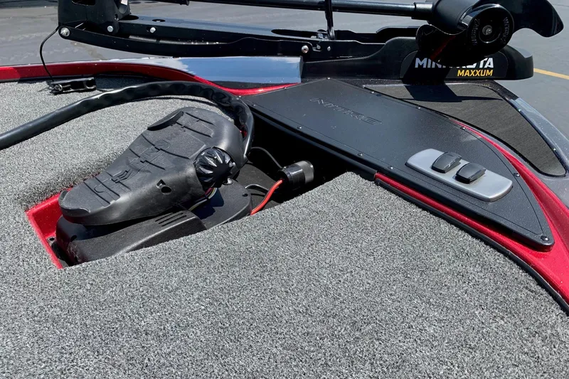 Slide: The Image of Foot pedal control on a 2026 Nitro Z17 boat with Minn Kota Maxxum trolling motor. - 7