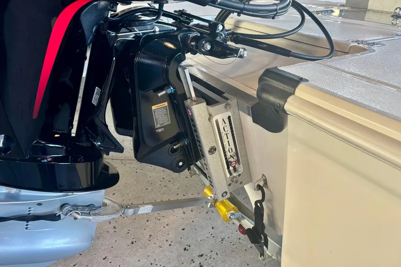 Slide: The Image of 2026 Mako 18 Pro Skiff boat engine and transom detail. - 5