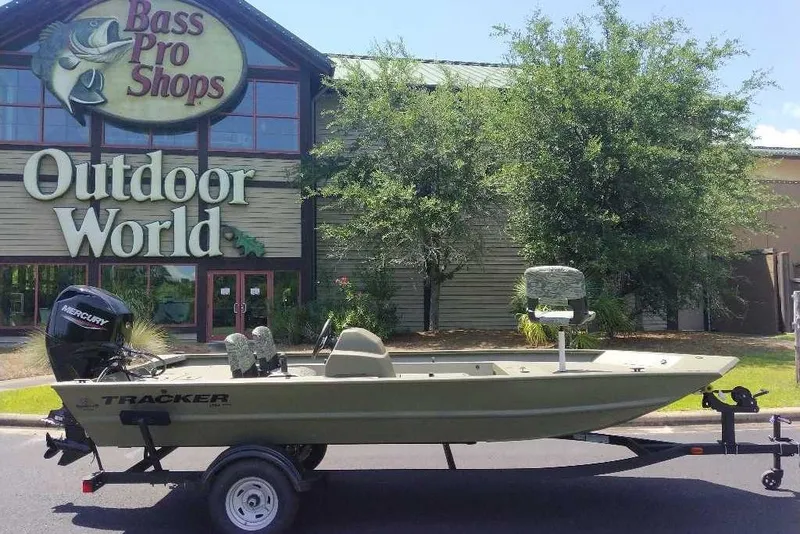 Slide: The Image of 2026 Tracker Grizzly 1754 SC boat outside Bass Pro Shops Outdoor World. - 11