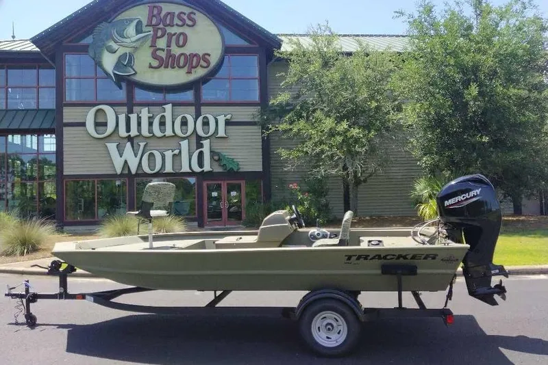 Slide: The Image of 2026 Tracker Grizzly 1754 SC boat outside Bass Pro Shops Outdoor World. - 12