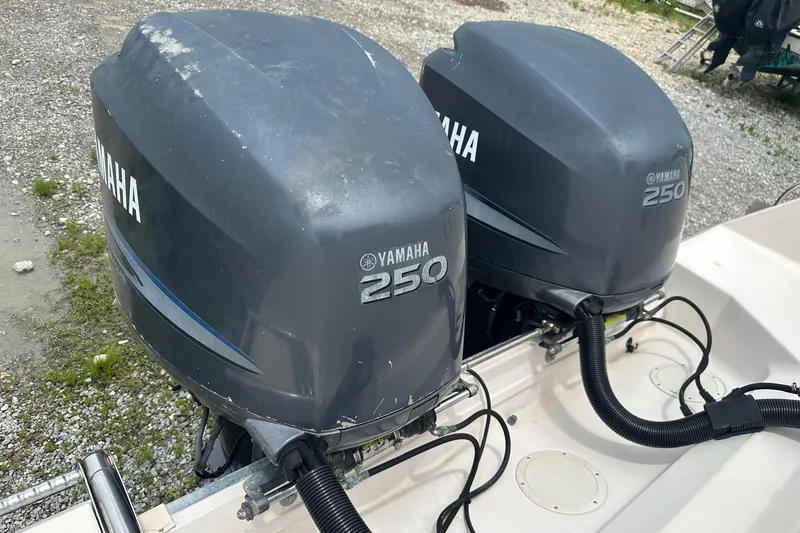 Slide: The Image of Twin Yamaha 250 outboard engines on a 2006 Grady-White Marlin 300 boat. - 16