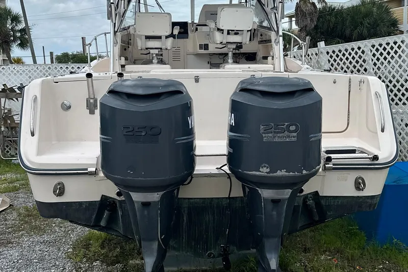 Slide: The Image of 2006 Grady-White Marlin 300 boat with twin Yamaha 250 outboard engines. - 17