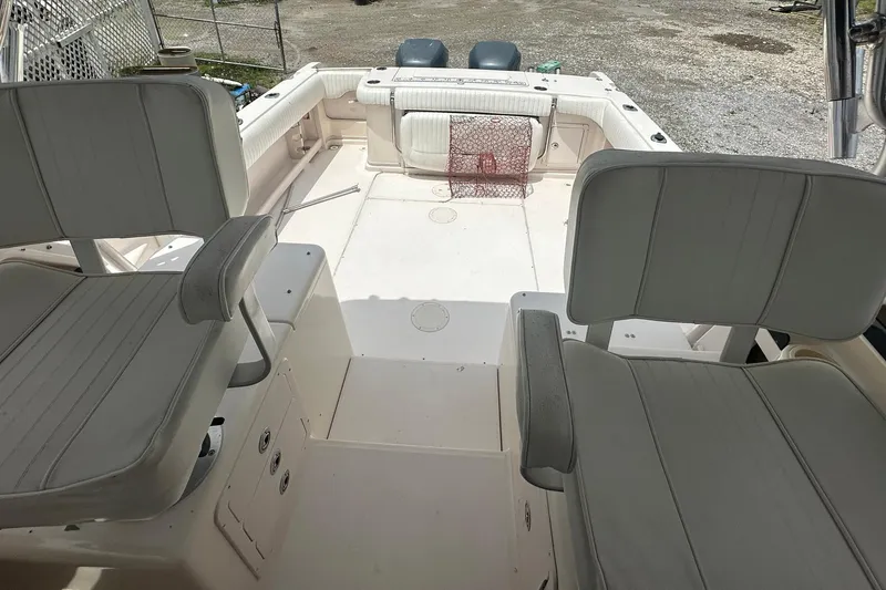 Slide: The Image of 2006 Grady-White Marlin 300 boat interior with seating and fishing equipment. - 7
