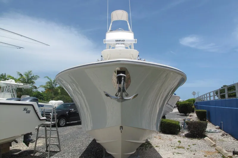 Slide: The Image of 2022 SeaVee 322Z boat on display, front view under clear blue sky. - 6