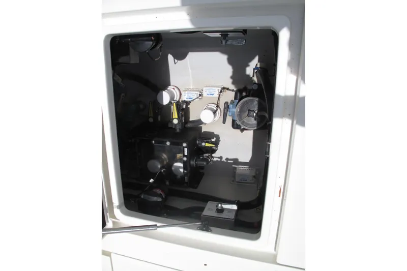 Slide: The Image of Engine compartment of 2022 SeaVee 322Z boat, showcasing mechanical components and systems. - 13