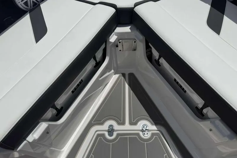 Slide: The Image of 2026 Monterey Elite 30 OB boat interior with sleek seating and modern design. - 49