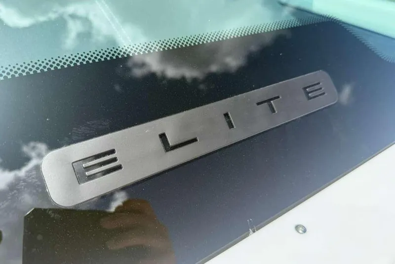 Slide: The Image of Close-up of 2026 Monterey Elite 30 OB logo on a reflective surface. - 50