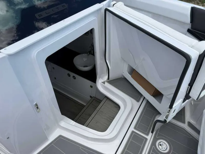 Slide: The Image of View of a cabin entrance with a sink on a boat. - 10