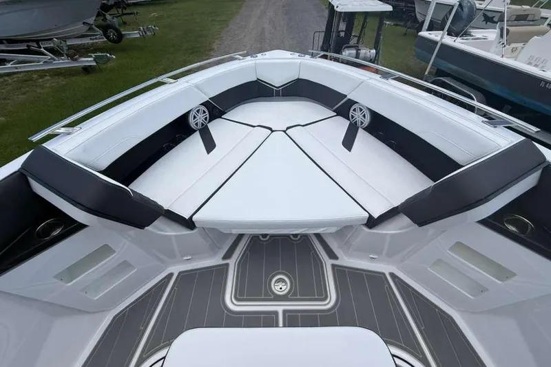 Slide: The Image of Luxurious seating area on the 2026 Monterey Elite 30 OB boat, featuring sleek design and comfort. - 43