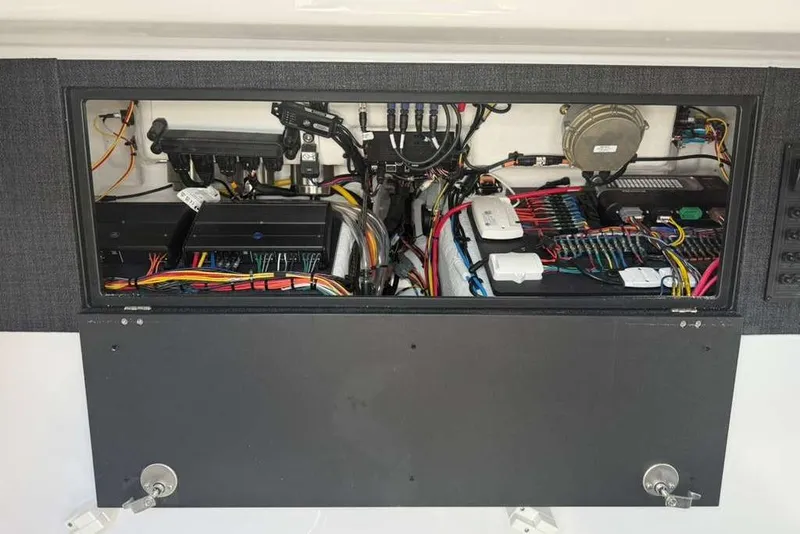 Slide: The Image of Electrical panel of 2026 Monterey Elite 30 OB boat, showcasing wiring and components. - 33