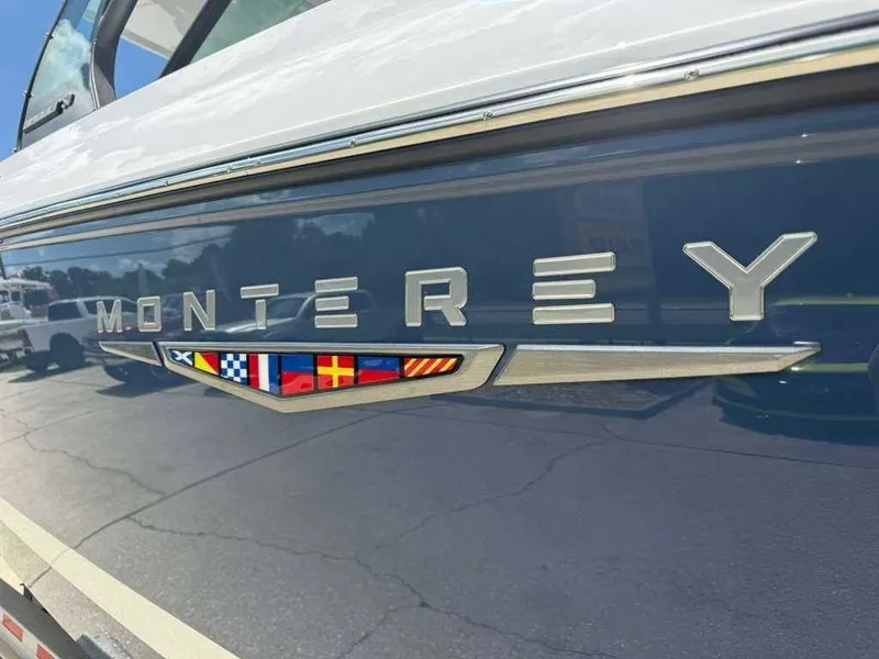 Slide: The Image of Close-up of the Monterey logo on a boat hull. - 4