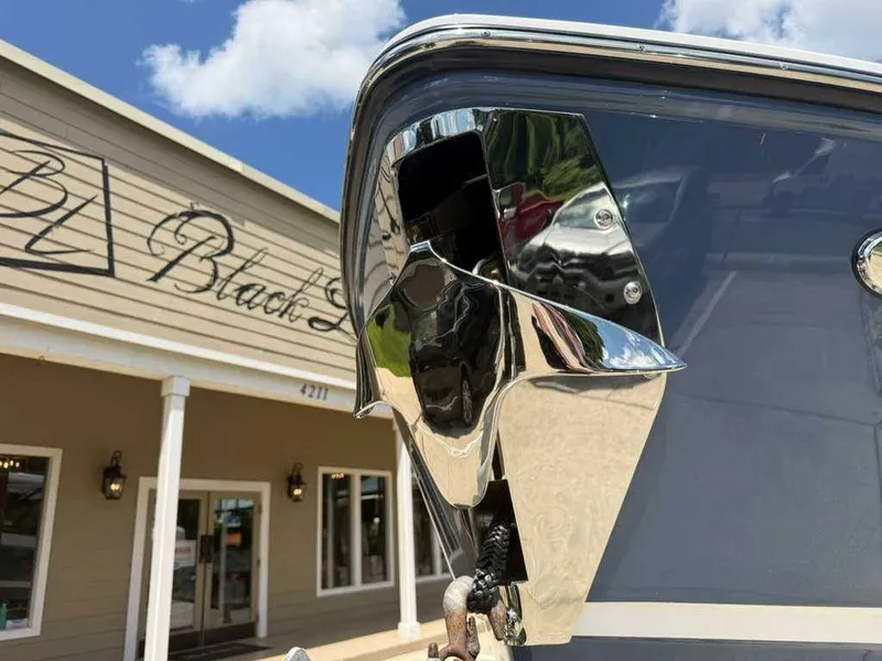 Slide: The Image of Close-up of the bow of a Monterey Elite 30 OB boat with shiny chrome details. - 3