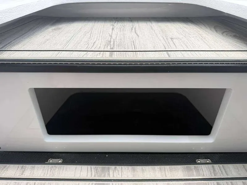 Slide: The Image of Close-up of a boat deck with wood-like texture and a rectangular opening. - 11