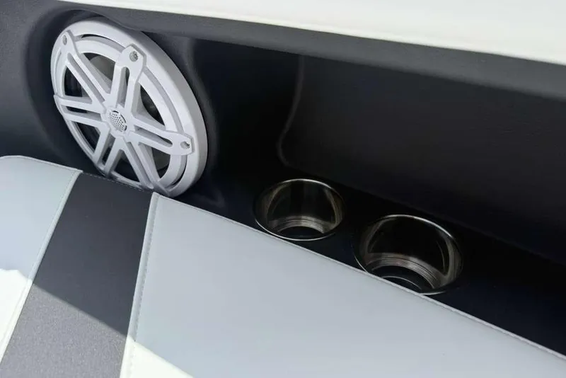 Slide: The Image of 2026 Monterey Elite 30 OB interior with speaker and cup holders. - 47