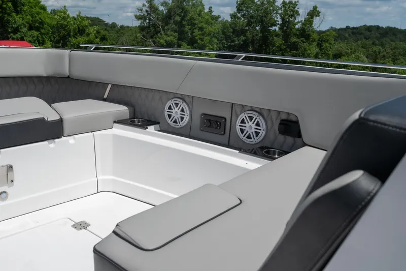 Slide: The Image of Interior of 2026 Monterey 385SS Super Sport boat with luxurious seating and speakers. - 20