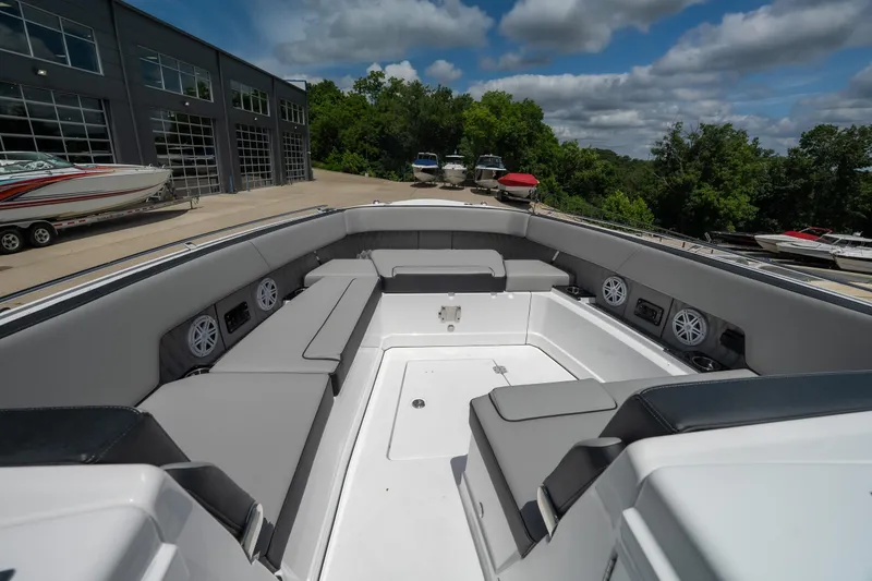 Slide: The Image of 2026 Monterey 385SS Super Sport boat interior with spacious seating and modern design. - 21
