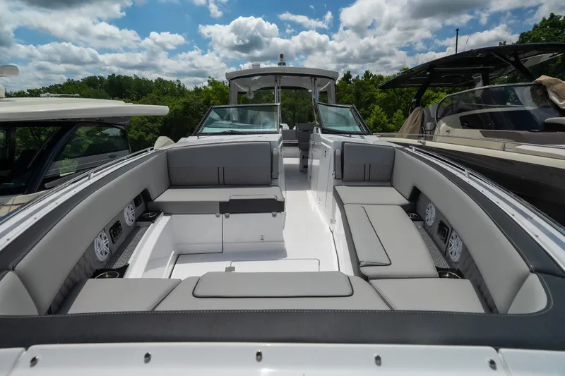 Slide: The Image of 2026 Monterey 385SS Super Sport boat interior with luxurious seating and modern design. - 24