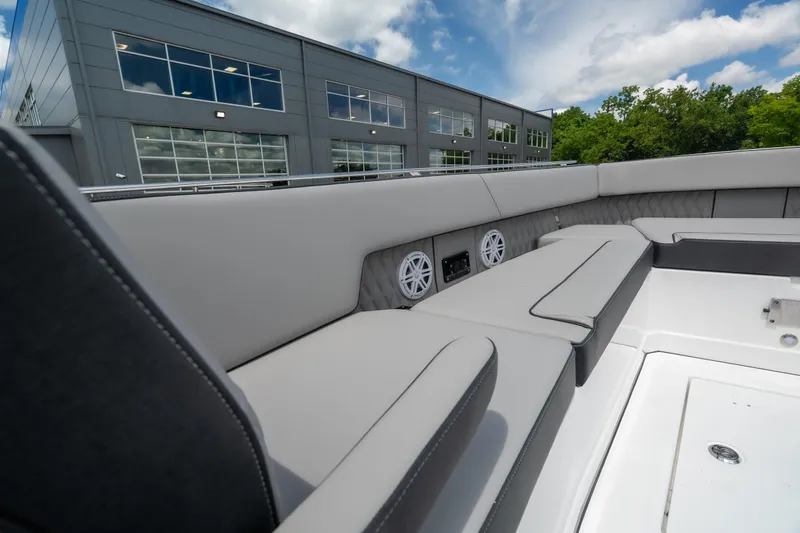 Slide: The Image of 2026 Monterey 385SS Super Sport boat interior with sleek seating and modern design. - 25